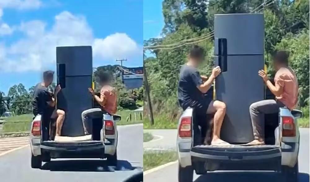 Homens são flagrados segurando geladeira na caçamba de picape em rodovia de Piedade